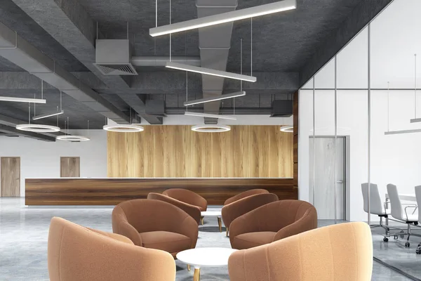 Alan, resepsiyonda bekleyen bej koltuk