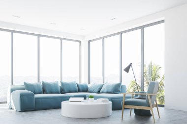 Beyaz salon iç mavi bir kanepe ile köşe