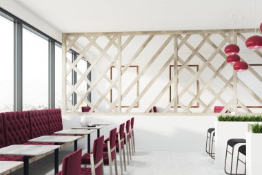 Çatı kafe ile kırmızı kanepe, posterler