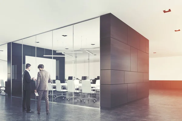 Gray conference room, a poster, men — Stock Photo, Image