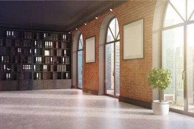 CEO office, kitaplık ve tonda iki posterler