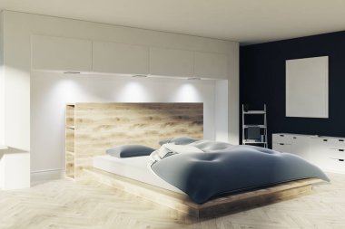 Siyah ve beyaz yatak odası, bir poster