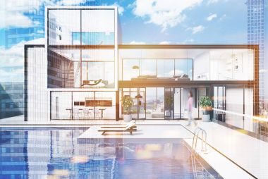 Tonda bir yüzme havuzu bulunan büyük beyaz ev