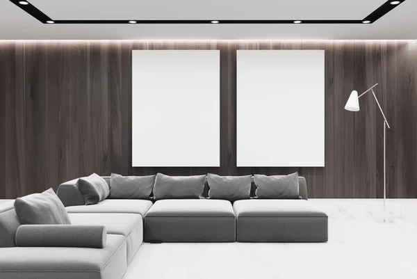 Sala de estar de madeira sofás cinzentos, cartazes, frente — Fotografia de Stock