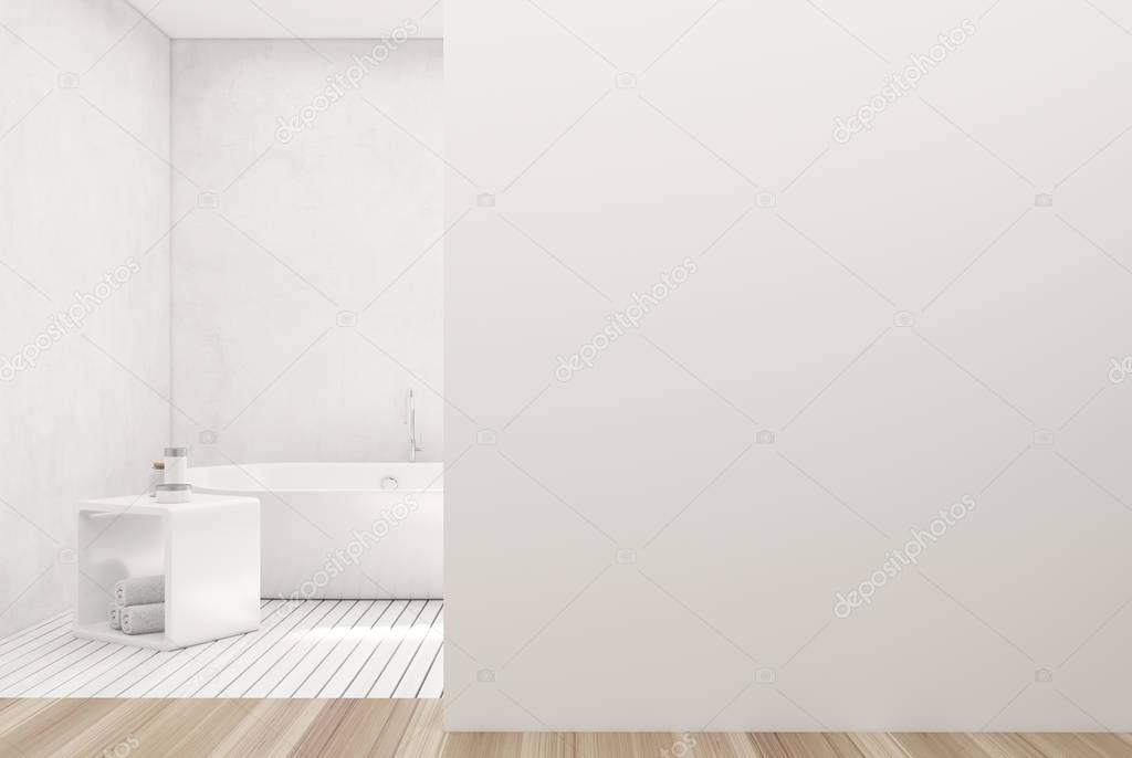 White bathroom, white tub, wall
