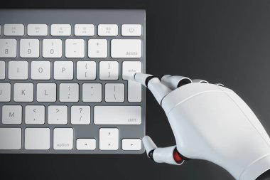 Robot el üstünde a bilgisayar klavye yazarak