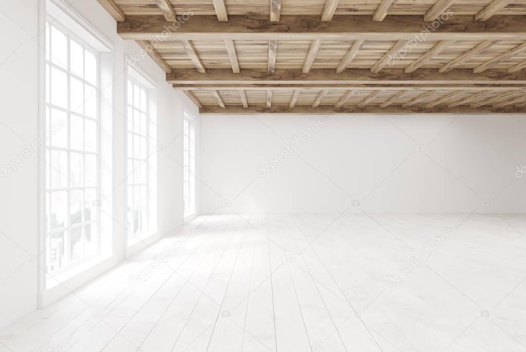 Empty room with large windows, side view