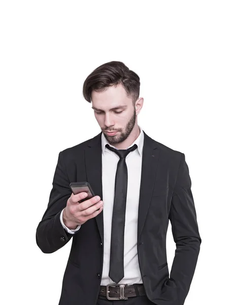 Young businessman looking at smartphone, isolated — Stock Photo, Image