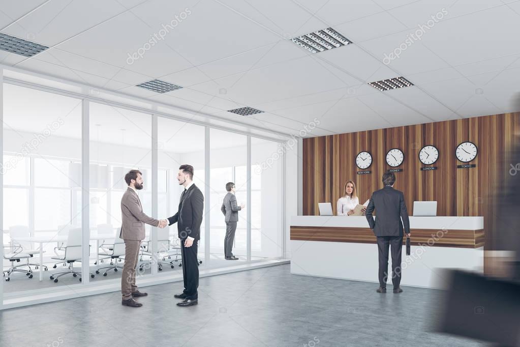 White and wooden reception, meeting room, men