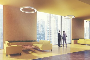 Bekleyen alan office, sarı kanepeler, köşe, insanlar