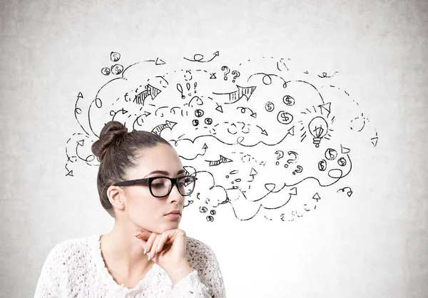 Pensive young woman in glasses, business questions — Stock Photo, Image