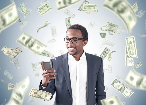 African American man, smartphone, dollar rain — Stock Photo, Image