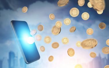 Smartphone, bitcoins, cityscape