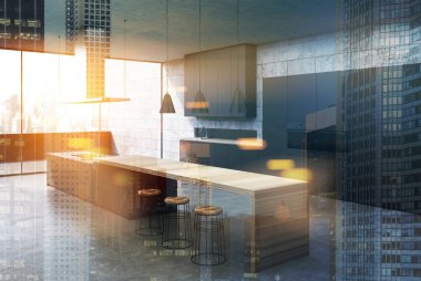 Beton mutfak, siyah dolapları, tonda köşe