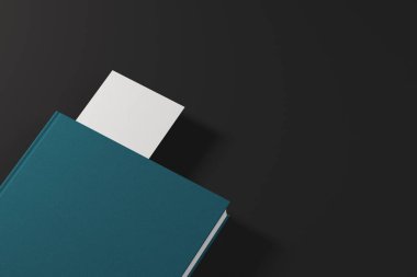 Beyaz yer işareti ile yeşil kitap