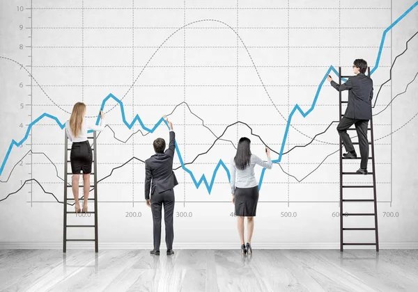 Business team on ladders, graphs — Stock Photo, Image