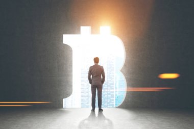 Kendine güvenen işadamı, bitcoin işareti
