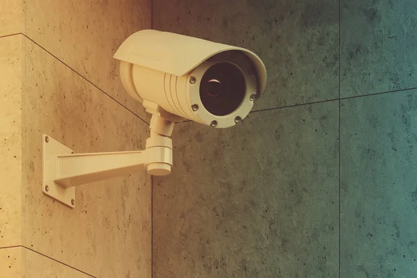 Wit Cctv camera op een grijze muur toned — Stockfoto