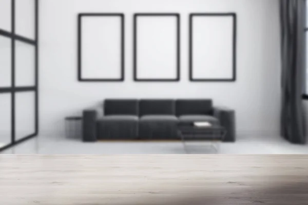 Серый диван, размытый плакат галереи — стоковое фото