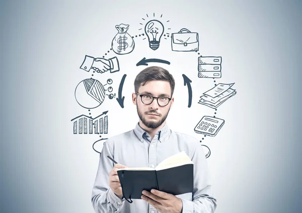 Intelligent man with planner, business process — Stock Photo, Image