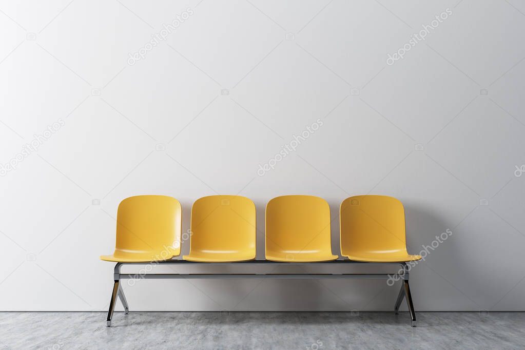 White room, yellow chairs