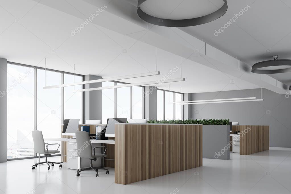 White office corner, wooden desks concrete