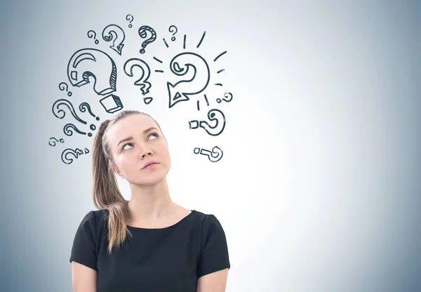 Pensive woman with a ponytail, questions attack — Stock Photo, Image