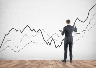 Bir marker, grafikler ile işadamı