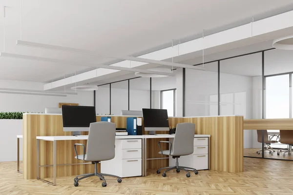 White office, wooden desks side