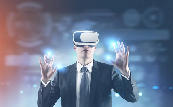 Businessman in VR glasses, HUD, blur — Stock Photo, Image
