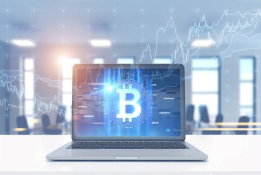 Dizüstü bitcoin sembol ve grafik, ofis