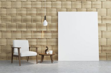 Beyaz bir koltuk ve bir poster ile bej Oda