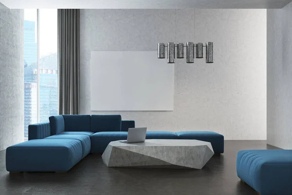 White living room, blue sofa, poster