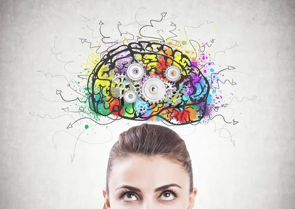 Pensive woman s head, cog brain — Stock Photo, Image