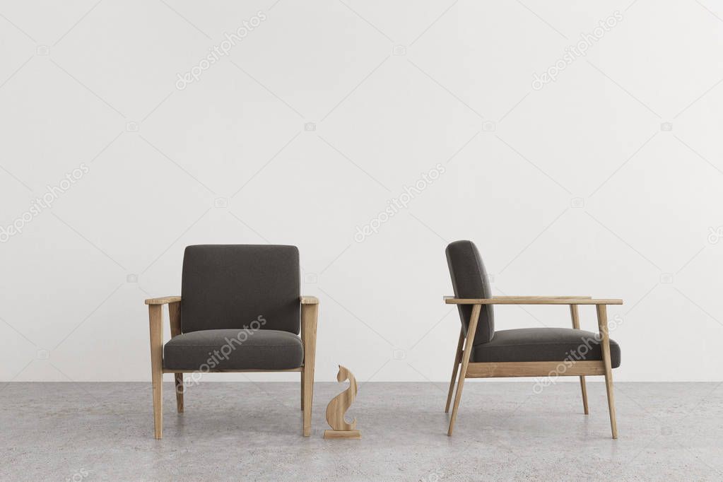 Two gray armchairs in a room