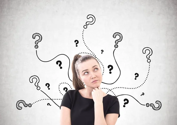 Pensive woman in T shirt, questions — Stock Photo, Image