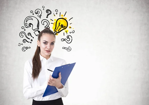 Young businesswoman writing, question, idea Royalty Free Stock Images