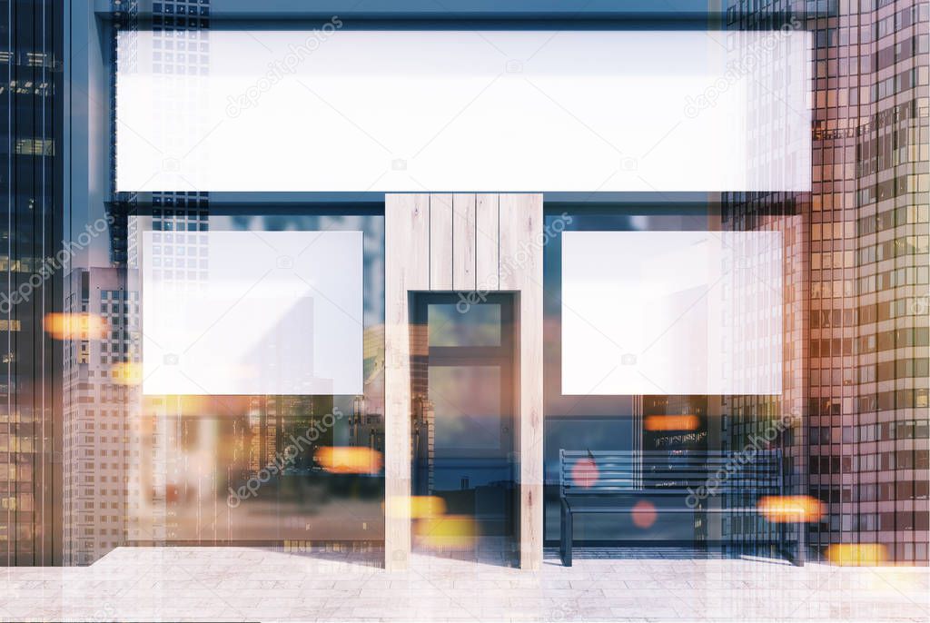 Gray and wooden cafe facade, two posters toned