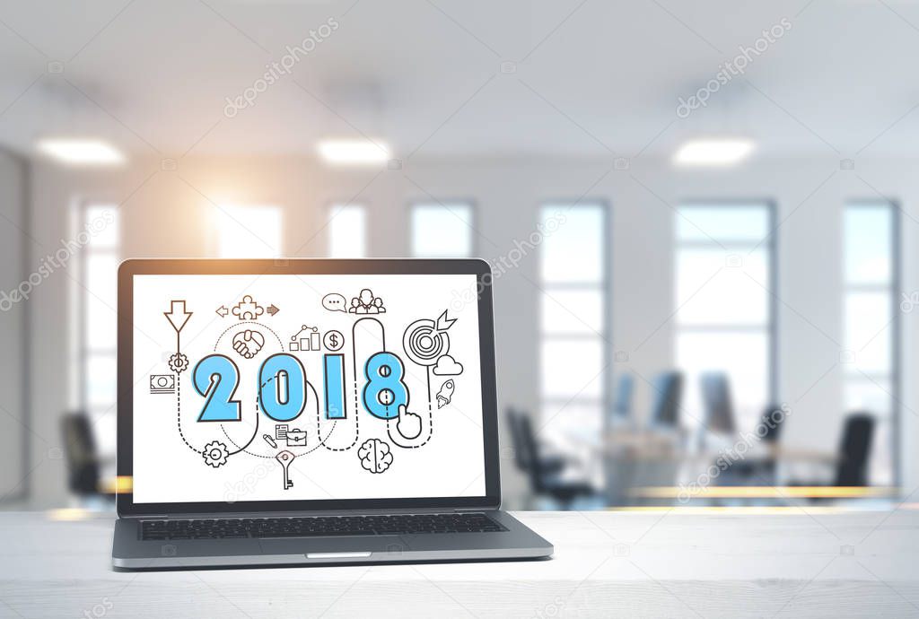 2018 start up sketch on laptop screen in office