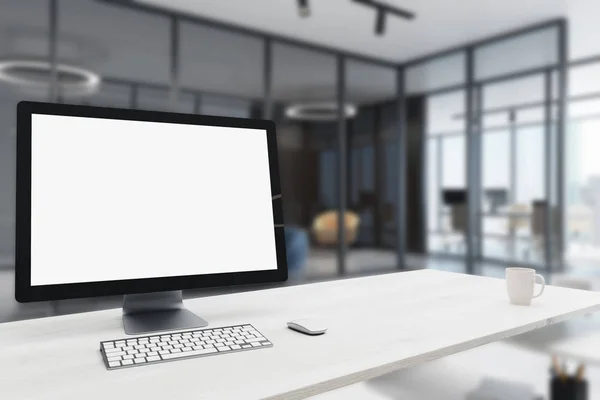 Blank computer monitor in office, side — Stock Photo, Image