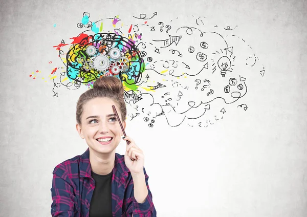 Smiling teen girl thinking, pencil, cog brain — Stock Photo, Image