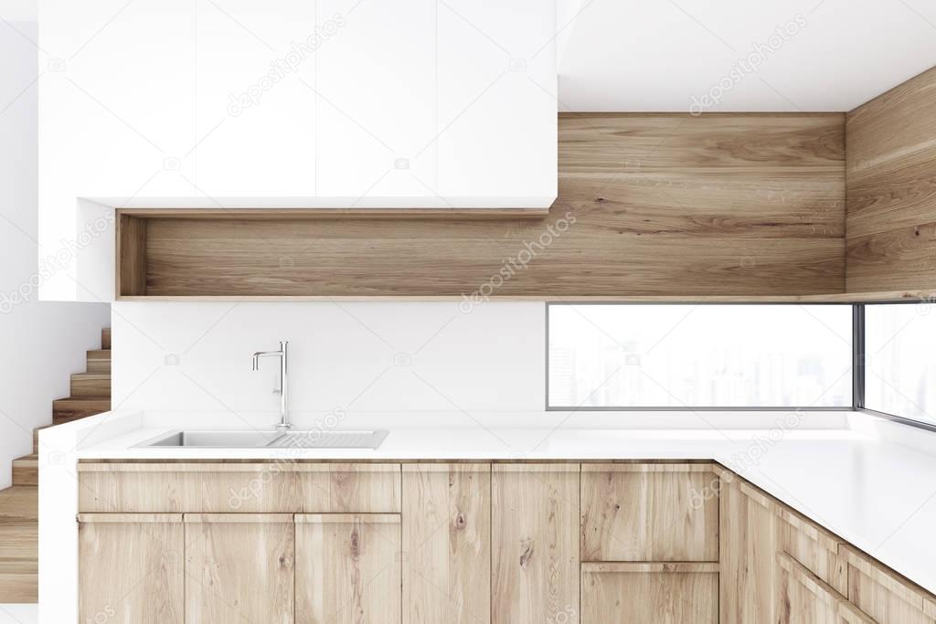 White kitchen with wooden countertops