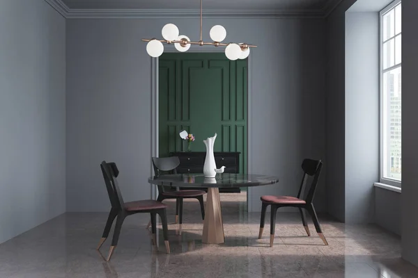 Intérieur de la salle à manger vert et gris, table noire — Photo