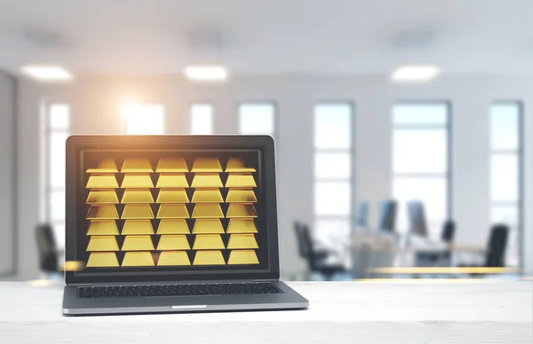 Ноутбук с золотыми слитками, офисный фон — стоковое фото