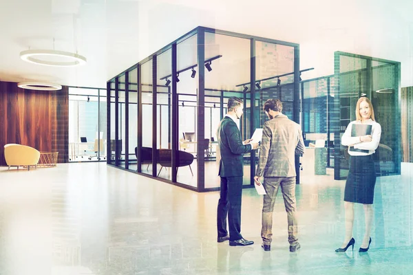 Glass and wooden office lobby toned