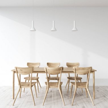 Bir beyaz odada ahşap yemek masası