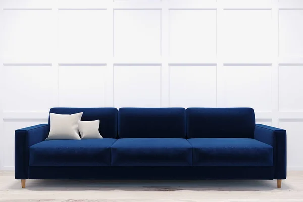 Темно-синий диван в белой комнате — стоковое фото