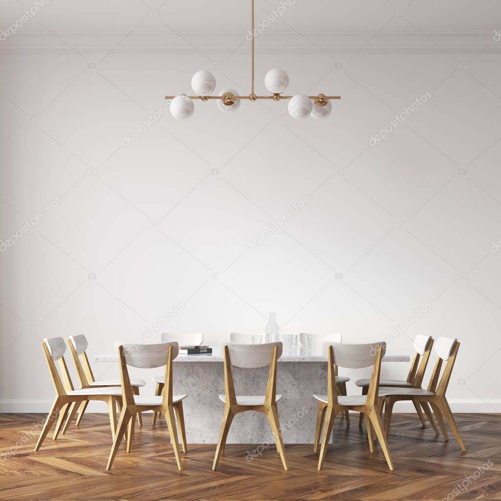 White dining table with design chairs