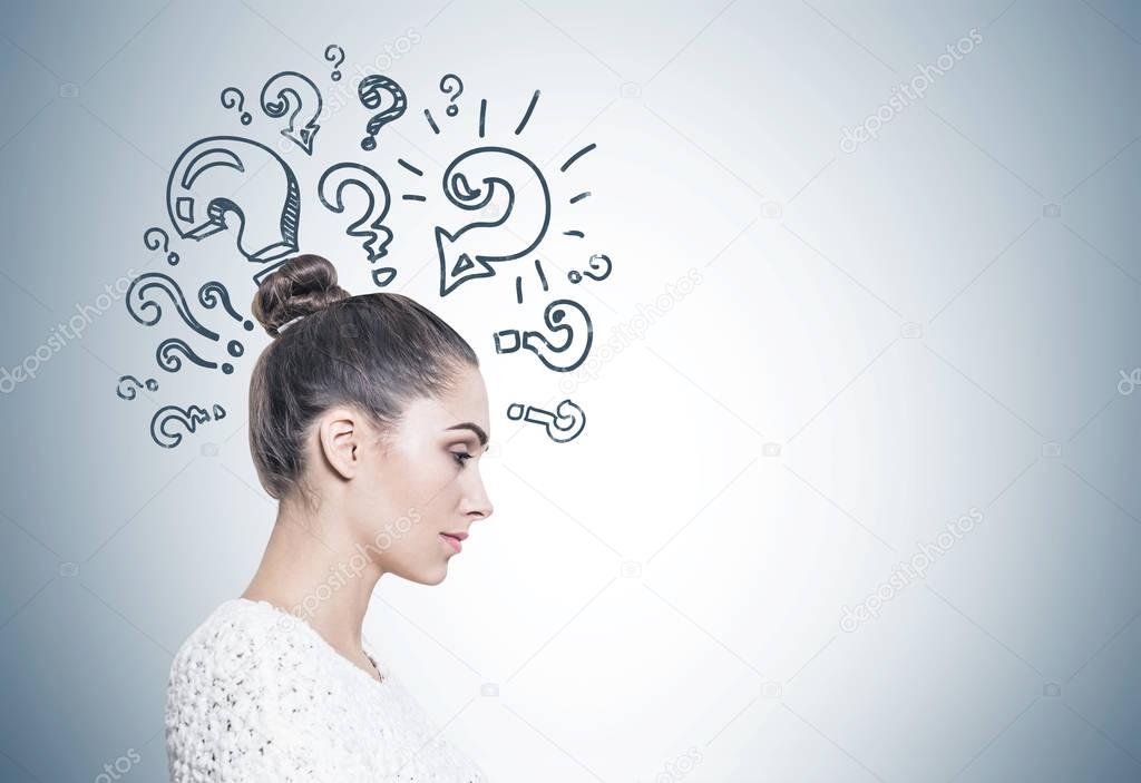 Profile of a calm woman in white, question marks