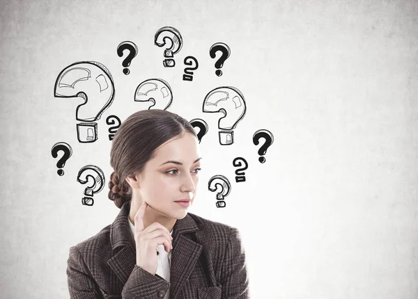 Thoughtful young brunette, many questions — Stock Photo, Image